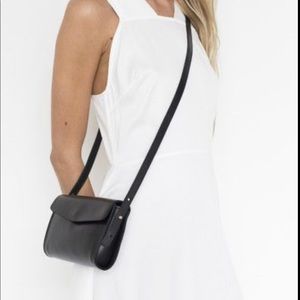Small black leather handbag by Assembly NY